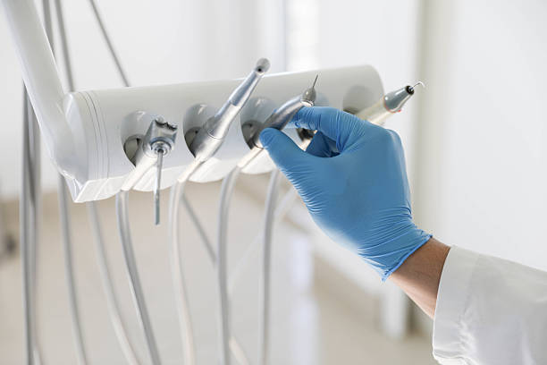 Professional Wisdom Tooth Removal technician working in Sherman, TX